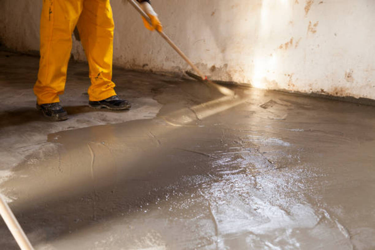 How can I effectively keep my concrete floor warm in winter?