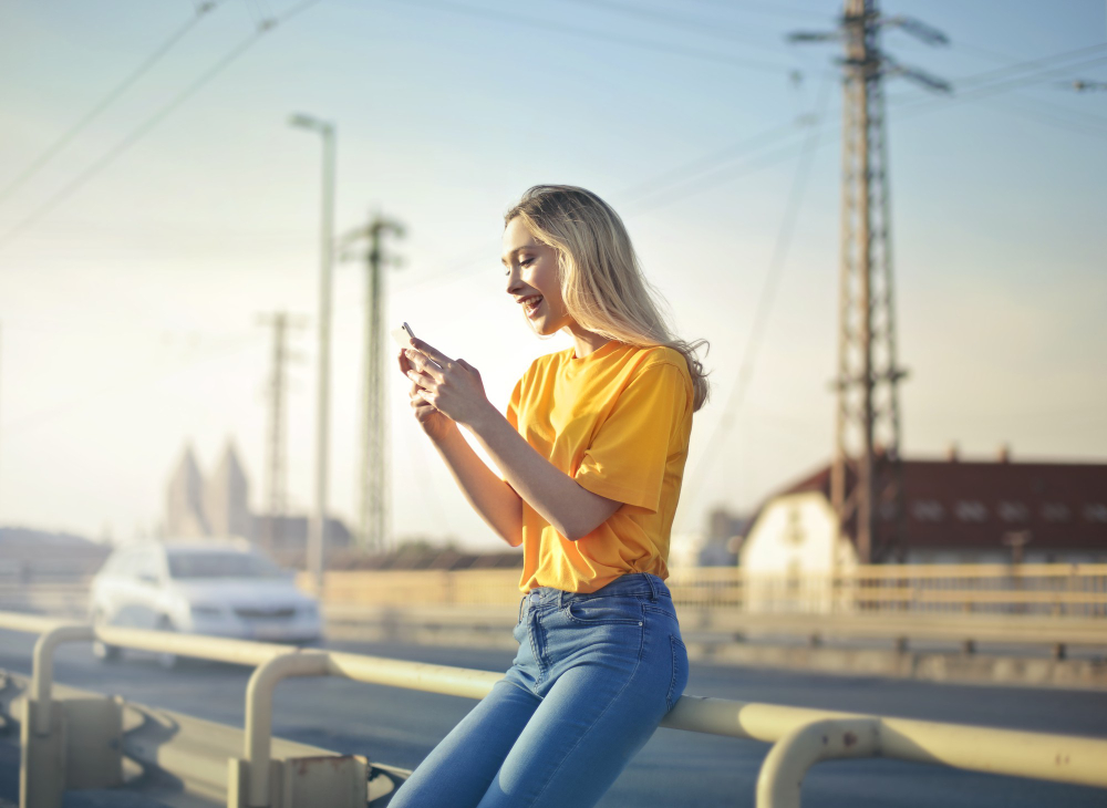 a girl using a satellite internet on her phone