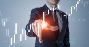 Businessman analyzing financial data charts on virtual screen for investment planning and growth strategy.